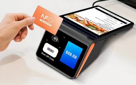 NORYOX NB80T Fiscal desktop POS terminal with 11-inch main screen showing restaurant menu, 4.3-inch customer display, NFC contactless payment, QR code scanner, and 80mm thermal printer.