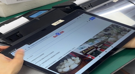 Engineers testing web browsing capabilities and software application compatibility across different operating systems to ensure a flawless user experience.
