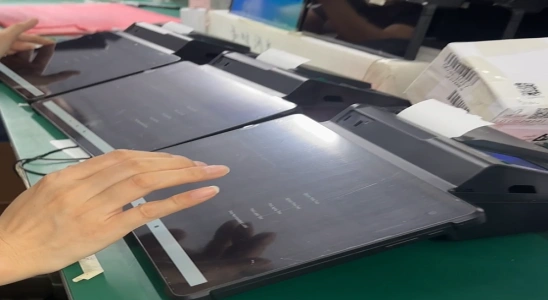 Simultaneous connectivity testing and touchscreen responsiveness checks on multiple units to guarantee seamless network communication and user interface reliability.
